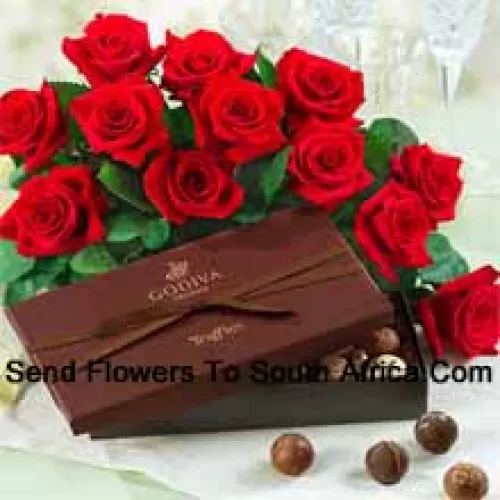 A Beautiful Bunch Of 12 Red Roses With Seasonal Fillers Accompanied With An Imported Box Of Chocolates