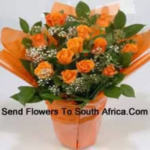 A Beautiful Arrangement Of 18 Orange Roses With Seasonal Fillers