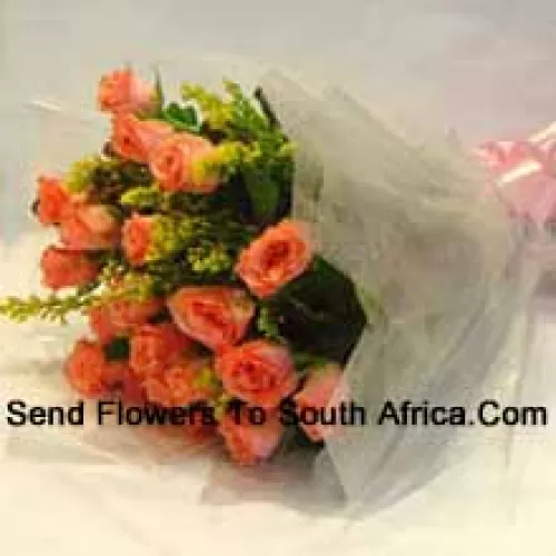 Bouquet de 18 roses orange avec des garnitures saisonnières